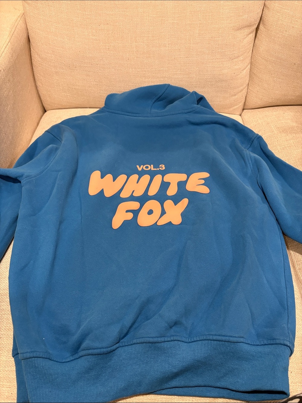 White Fox Boutique Blue Sweatshirt with Peach Logo